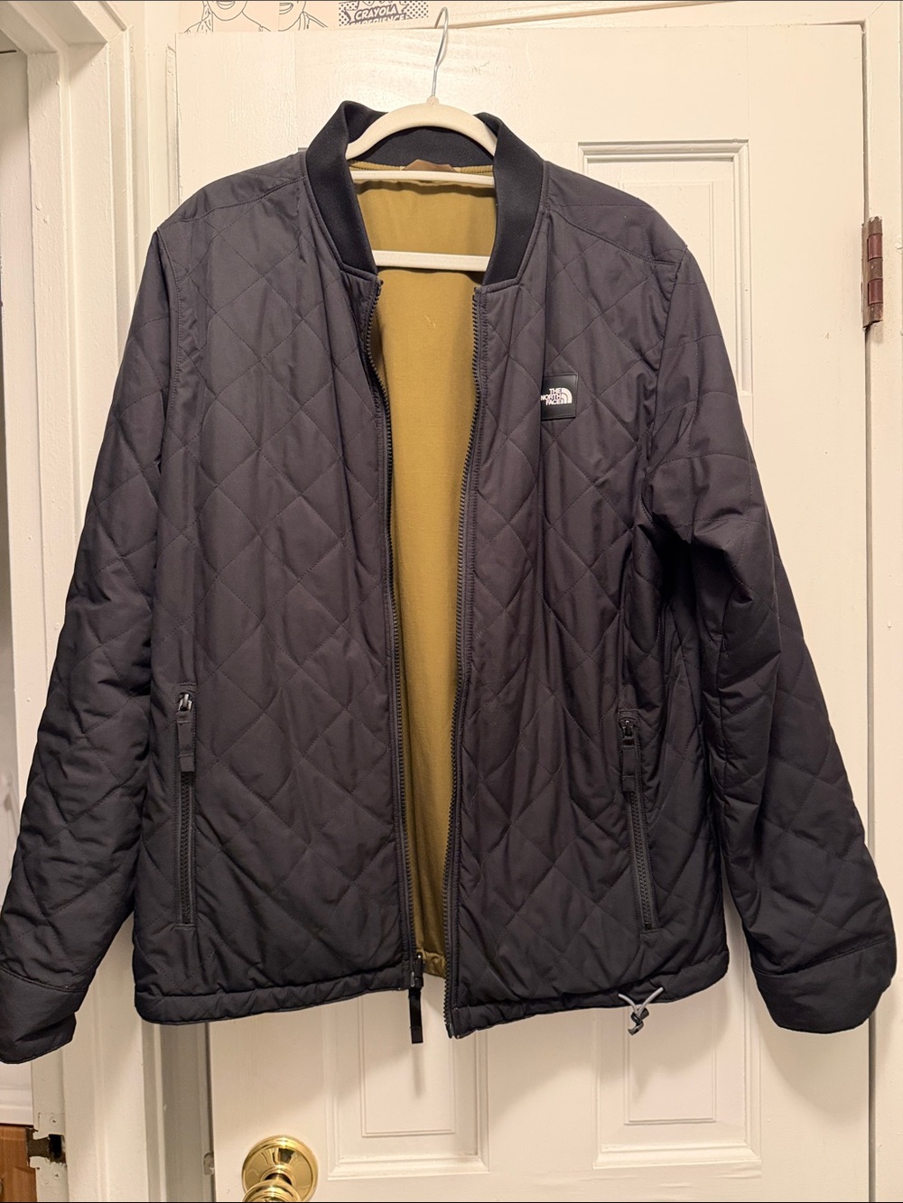The North Face Men's reversible Black Bomber Jacket with Olive Interior M